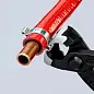 Клещи с боковым носиком для запрессовки, для хомутов с ушками, L-220 мм, чёрные, обливные рукоятки (KNIPEX)